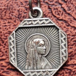 Virgin mary medal