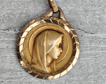 Gold-plated Virgin Mary medal