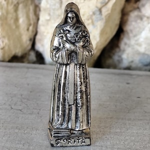 Ancient religious statue of Saint Rita