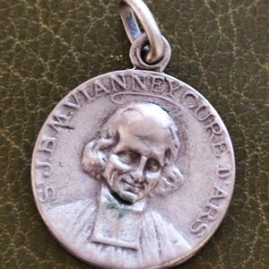 Rare vianney and saint Christopher medal