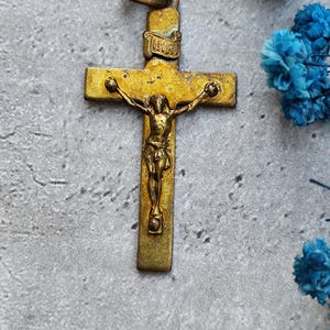 Antique golden colored religious cross religious crucifix from Rome