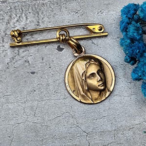 virgin mary brooch