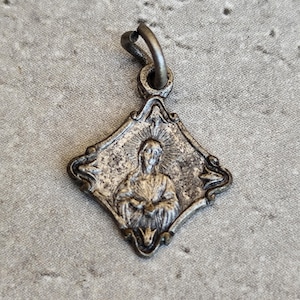 gold plated Virgin mary medal