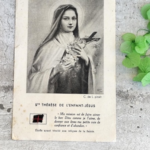 Carte relique de sainte Thérèse de Lisieux avec etoffe ayant touché aux reliques de la sainte