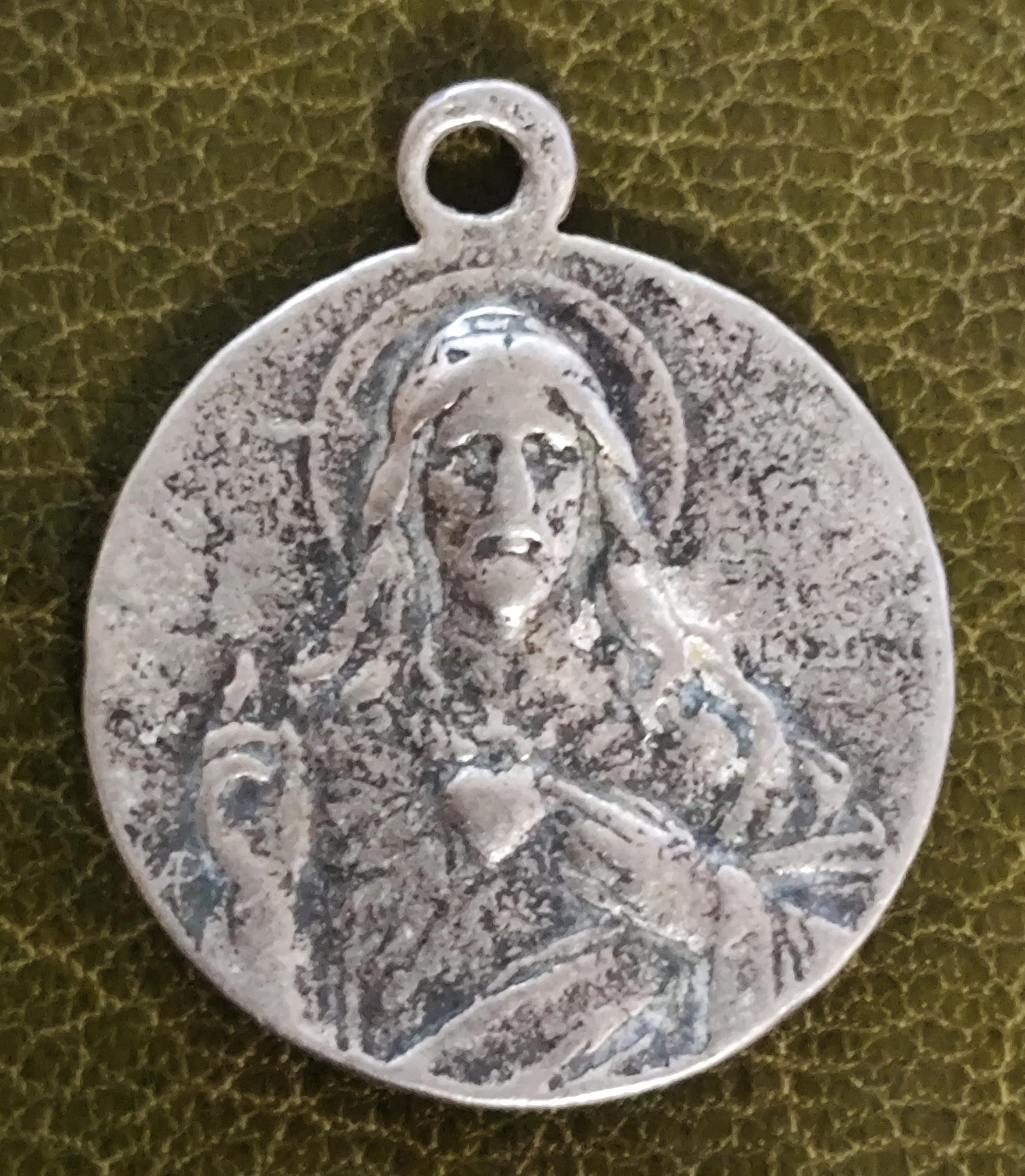 L'importance de la médaille de baptême de la Vierge à l'Enfant L'importance de la médaille de baptême de la Vierge à l'Enfant