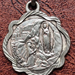Saint christopher and our lady lourdes medal