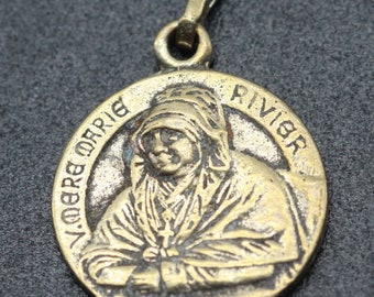 rare médaille mère rivier