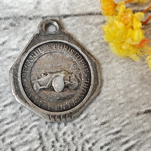 saint Christopher and saint Teresa medal