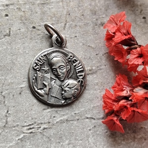 saint benilde medal