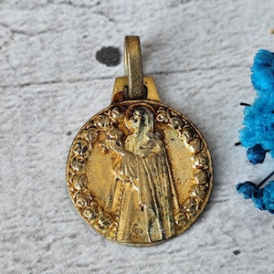 Antique religious medal of Saint Theresa by Ferdinand Py