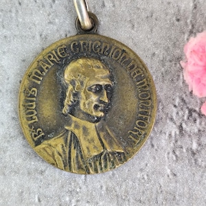 Rare religious medal of Saint Louis-Marie Grignion de Montfort and the Virgin Mary
