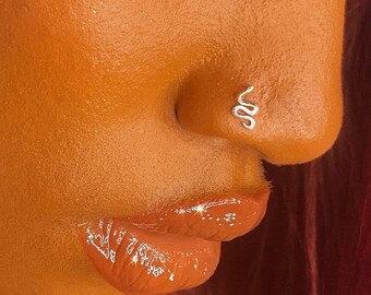 Snake deals nose hoop