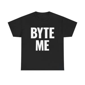 May include: A black short-sleeved t-shirt featuring the text "BYTE ME" printed in large, bold, white capital letters across the center of the chest. The garment has a standard crew neckline and a straight hemline, presented on a plain background.