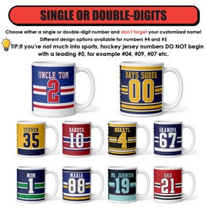 May include: Nine white ceramic mugs with colorful hockey jersey designs and numbers. The mugs feature names like "Uncle Tom", "Days Sober", "Steven", "Dakota", "Merryl", "Grandpa", "Mom", "Maria", "Mr. Johnson", and "Dad".