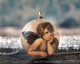 May include: A silver chain necklace with a round pendant featuring a painting of a cherub with wings, looking thoughtful.