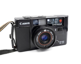 For parts: Canon AF35M 35mm Film Camera