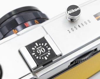 ニコン100周年記念カスタム真鍮ホットシューカバー：ZF/ZFC/Z30/Z50
