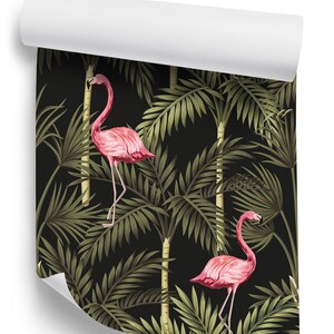 May include: A seamless pattern featuring pink flamingos standing in lush green palm trees against a black background.