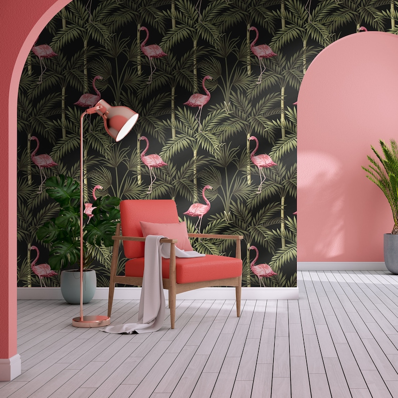 May include: A black and green wallpaper with a repeating pattern of pink flamingos and palm trees. The wallpaper is in a room with a pink wall and a red chair.
