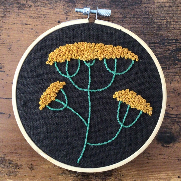 Embroidery of dill flowers