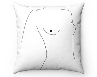 May include: A white throw pillow with a black line drawing of a torso on it.