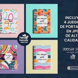 May include: Four spiral-bound notebooks with colorful covers, each labeled "AGENDA 2026" and "mi mejor a&ntilde;o." The image includes text in Spanish and a logo for "two hands creativos."