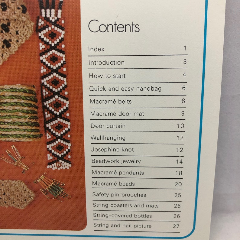 May include: A book titled "Contents" with a list of craft projects, including macrame, beadwork, and string art. The book features images of various crafts, such as a macrame doormat, a beaded bracelet, and a string-covered bottle.