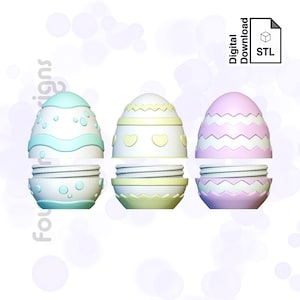 Può includere: Tre contenitori decorativi a forma di uovo di Pasqua nei colori pastello: azzurro, giallo e rosa. Ogni uovo è diviso in due parti, con la metà superiore con motivi decorativi e la metà inferiore che funge da base. L'immagine include il testo "Digital Download STL".