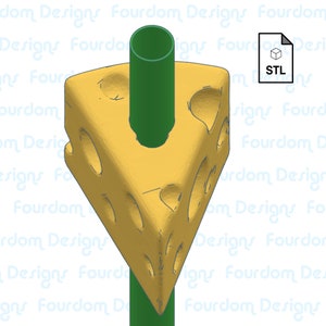 May include: A 3D-rendered image of a yellow cheese wedge with several holes, and a green cylindrical rod inserted through it. The image also includes a white icon with the text "STL". The background features a repeating pattern of the text "Fourdom Designs".