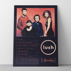 May include: A framed poster featuring the band Lush. The poster has a red and black color scheme with the band members in the center. The album title "Spooky" is displayed, along with a tracklist.