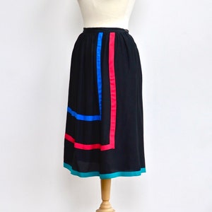 1980s black silk, New Wave, colour block skirt with blue, red and turquoise lines and deep POCKETS. XSmall-Small. Minimalist. Punk. Preppy.