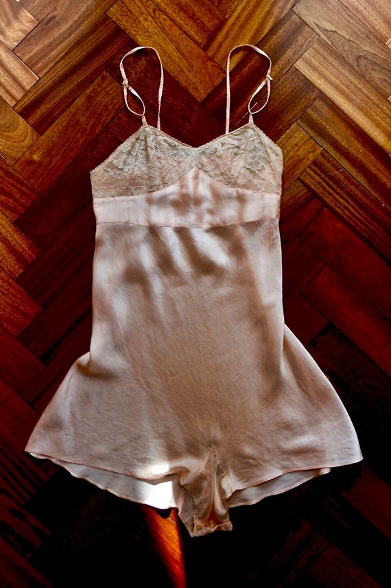 1930s peach-pink, silk satin teddy with lace bust.