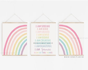 May include: Three printable wall art prints with rainbow designs. The center print features the text "I am strong, I am kind, I am valued, I am loved, I am brave, I am creative, I am beautiful, I am Jamee, I can do hard things".