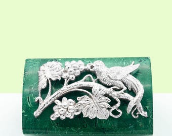 May include: A green malachite box with a silver bird and grapevine design on the lid.