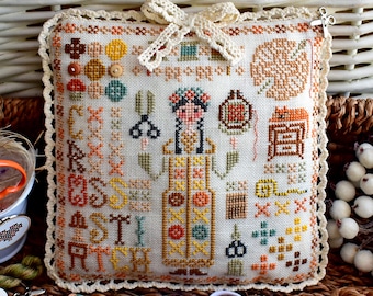Miss Cross Stitch primitive sampler pattern PDF / girl cat scissors alphabet by StitchyPrincess Ukraine