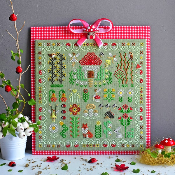 Woodland fairies primitive cross stitch pattern PDF Spring garden border sampler mushroom butterfly hedgehog flowers fox StitchyPrincess