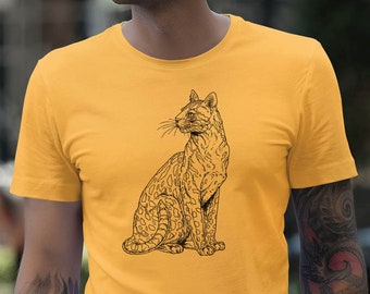 May include: A yellow t-shirt with a black and white illustration of a jaguar sitting on its haunches.