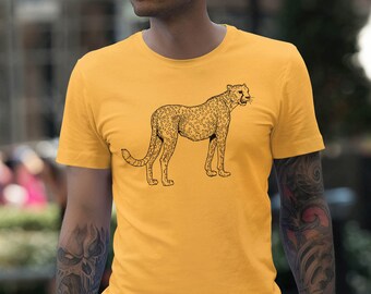 Puede incluir: Una camiseta amarilla con una ilustración en blanco y negro de un guepardo en la parte delantera.