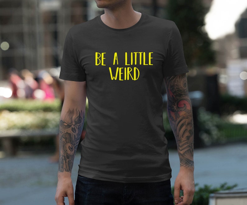 Moon Mouse Apparel Be a Little Weird Yellow Text Unisex Adult Printed Cotton Crew T Shirt