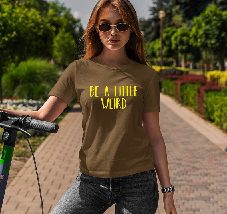 Moon Mouse Apparel Be a Little Weird Yellow Text Unisex Adult Printed Cotton Crew T Shirt