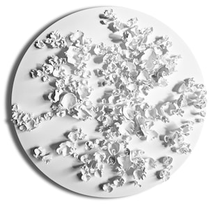 May include: White ceramic wall art with a circular shape and a textured design resembling a cluster of flowers or coral.