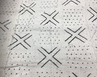 Paño de barro blanco tejido a mano con estampado de cruces