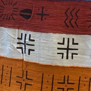 Hand Woven Red/White/Orange/Blue Mud Cloth, cowrie shells, gye nyame