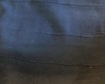 Mantel de barro negro tejido a mano