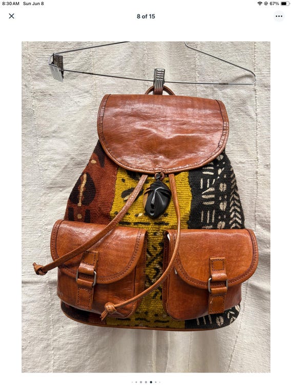 Tan Leather Back Pack, Mud Cloth Inlay, Two Pockets, Wooden  display picture 1