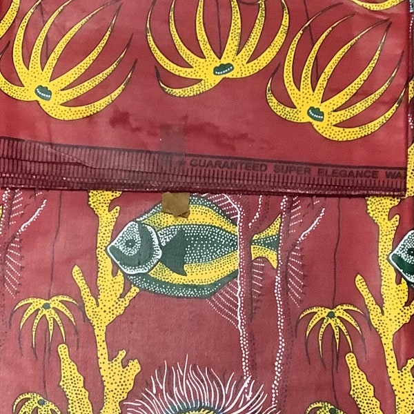 African Print Fabric, salt water fish, algae, burgundy background, starfish, fishbowl