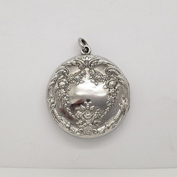 Antique FOSTER & BAILEY Art Nouveau Floral Repousse Solid Sterling Silver Round Photo Locket 1-1/2" long 10.8 grams circa late 1800s M5046