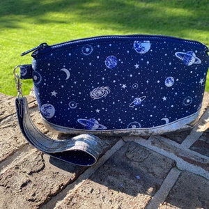 Clematis Wristlet in space print