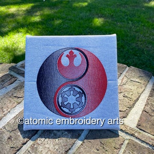 Balanced Force embroidered wall art