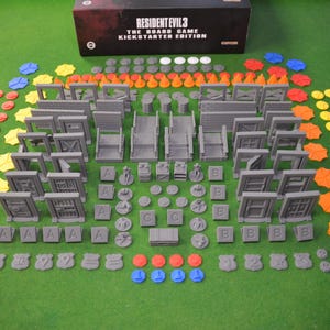 May include: Resident Evil 3: The Board Game Kickstarter Edition components.  The game includes a variety of plastic pieces, including character figures, doors, walls, and other objects.  The game also includes a number of dice, tokens, and cards.